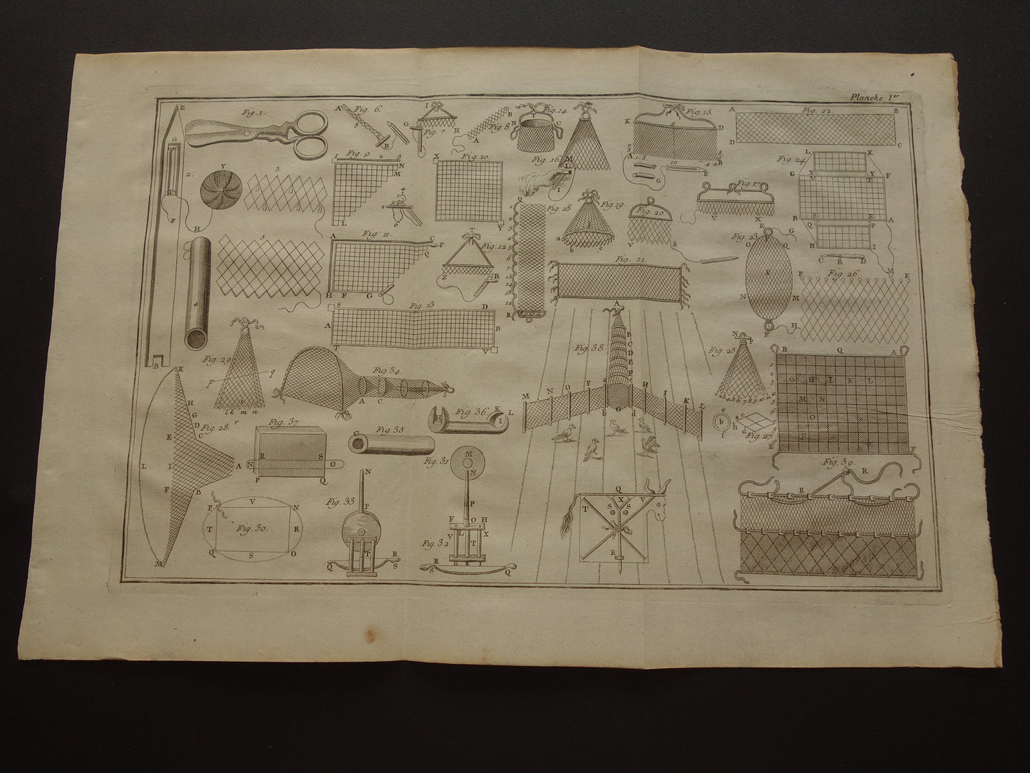 Oude prent over vangen van vogels uit 1751 stroperij vogelnet originele antieke print gravure